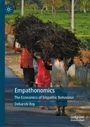 Texts: "Empathonomics," "The Economics of Empathic Behaviour," "Debarshi Roy." Drei Menschen tragen Holz auf dem Kopf.