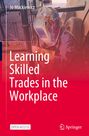 "Learning Skilled Trades in the Workplace" in weißer Schrift auf rotem Hintergrund. Person mit bemaltem Schweißhelm.