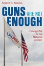 Text: "Andrew S. Natsios", "Guns Are Not Enough", "Foreign Aid in the National Interest". Zwei Fahnen, US-Flagge und USAID.
