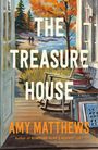 Titel: "The Treasure House". Autor: Amy Matthews. Illustration: Offene Tür, Herbstbaum, Meer, zwei Menschen am Strand.