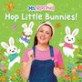 "Ms. Rachel Hop Little Bunnies!" ist der Text. Eine lächelnde Frau und drei fröhliche Hasen sind umgeben von Blumen und Schmetterlingen.