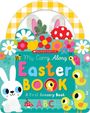 "Scholastic My Carry Along Easter Book A First Sensory Book ABC" in bunten Buchstaben, Hase, Küken und Blumen.