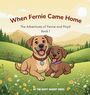„When Fernie Came Home“, Abenteuer von Fernie und Floyd, Buch 1. Zwei fröhliche Hunde vor einer hügeligen Landschaft.