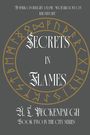 „A spark can relight a flame, much like love can reignite life.“ In Ringen Runensymbole, darunter „Secrets in Flames“.