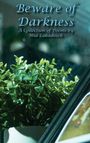 "Beware of Darkness: A Collection of Poems by Mia Lakadosch" steht oben. Ein grüner Pflanzentopf vor einem Spiegel.
