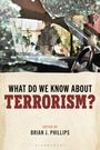 „What Do We Know About Terrorism?“ Großaufnahme eines Soldaten durch zerbrochenes Autofenster. Bearbeitet von Brian J. Phillips.