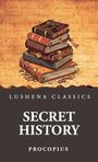 "Lushena Classics Secret History Procopius" auf einem Stapel alter Bücher vor antikem Skript.
