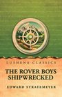 "LUSHENA CLASSICS: THE ROVER BOYS SHIPWRECKED von Edward Stratemeyer. Illustration mit Steuerrad und Berglandschaft."