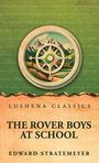 "THE ROVER BOYS AT SCHOOL" von Edward Stratemeyer. Illustration eines Schiffssteuerrads vor einer Berglandschaft.