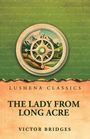 "LUSHENA CLASSICS" über dem Titel "THE LADY FROM LONG ACRE" von Victor Bridges. Illustration eines Kompasses mit Bergen.