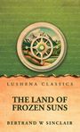 "LUSHENA CLASSICS. THE LAND OF FROZEN SUNS. BERTRAND W SINCLAIR." Darunter eine Illustration von Bergen und einem Kompass.
