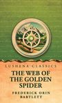 Lushena Classics: "The Web of the Golden Spider" von Frederick Orin Bartlett. Kompass-Illustration, Berge im Hintergrund.