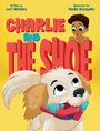 Text: "Charlie and the Shoe", "Written by Lori Whitley", "Illustrator Nadia Ronquillo". Illustration: Kind über großer Schrift, Hund mit Schuh.